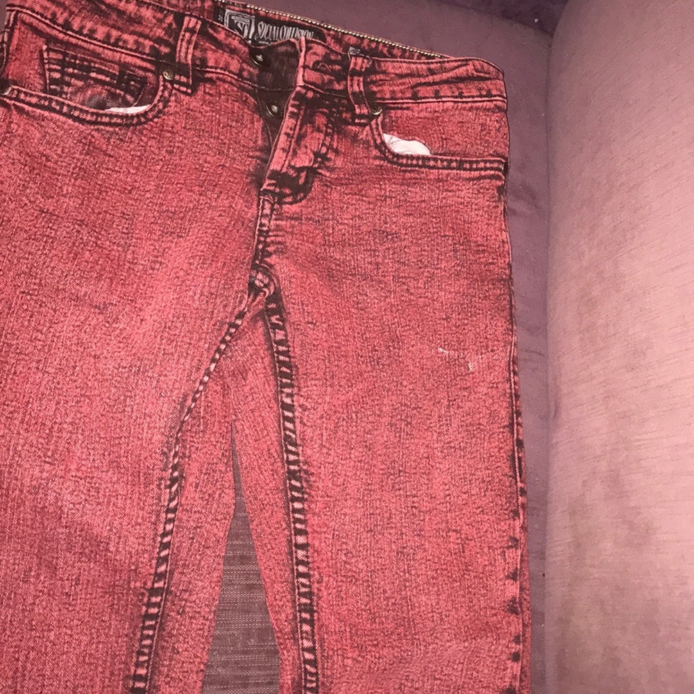 Red acid wash skinny jeans